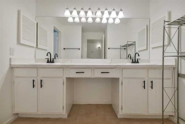 1100 Augusta Dr Unit 33, Houston, TX 77057 - bathroom with double vanity, tile patterned floors, and baseboards
