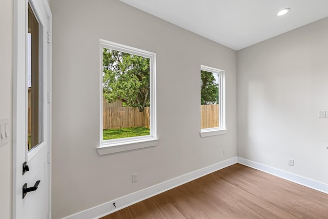 4224 Buck St, Houston, TX 77020 - spare room with baseboards, wood finished floors, and recessed lighting