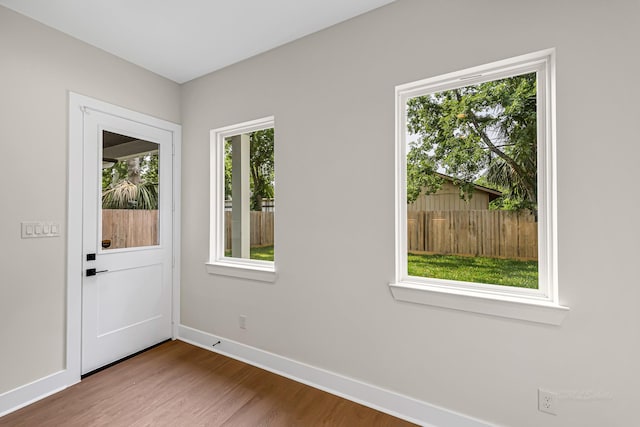 4224 Buck St, Houston, TX 77020 - doorway to outside with baseboards and wood finished floors