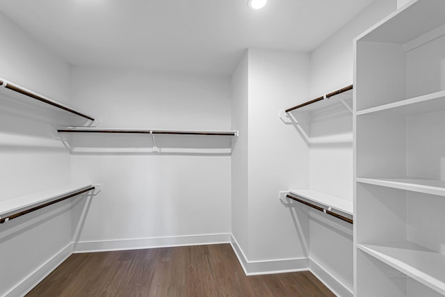 4224 Buck St, Houston, TX 77020 - walk in closet featuring dark wood-type flooring