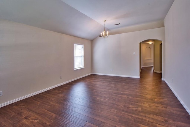 19511 Ingham Dr, Katy, TX 77449 - unfurnished room with dark wood-type flooring, a chandelier, arched walkways, baseboards, and lofted ceiling