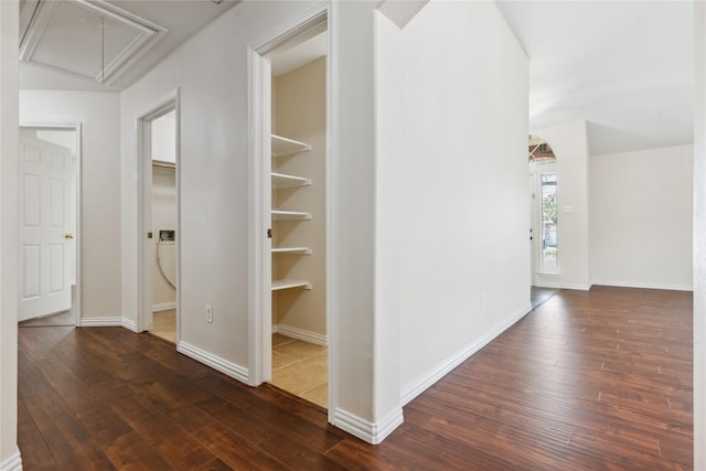 19511 Ingham Dr, Katy, TX 77449 - hall with attic access and dark wood-style flooring