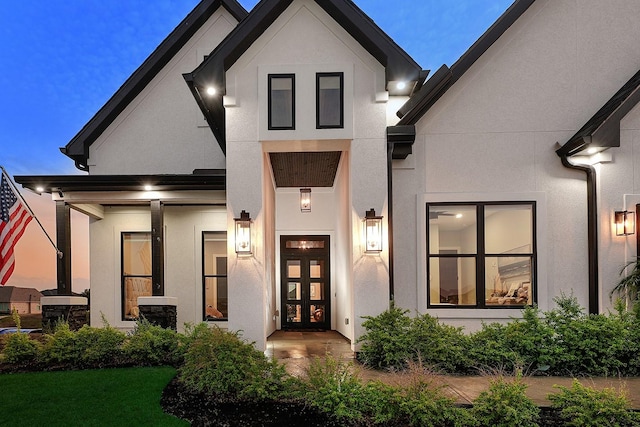 12595 St Louis Ct, Willis, TX 77318 - view of front of home with stucco siding