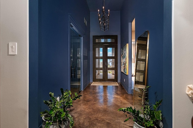 12595 St Louis Ct, Willis, TX 77318 - foyer featuring a chandelier and finished concrete flooring