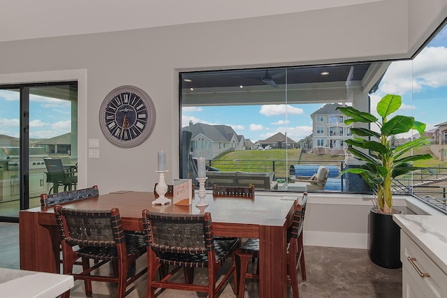 12595 St Louis Ct, Willis, TX 77318 - dining space with concrete floors