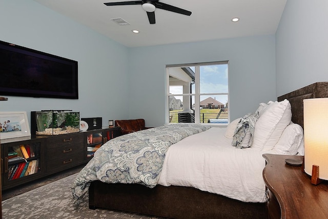12595 St Louis Ct, Willis, TX 77318 - bedroom featuring a ceiling fan and recessed lighting