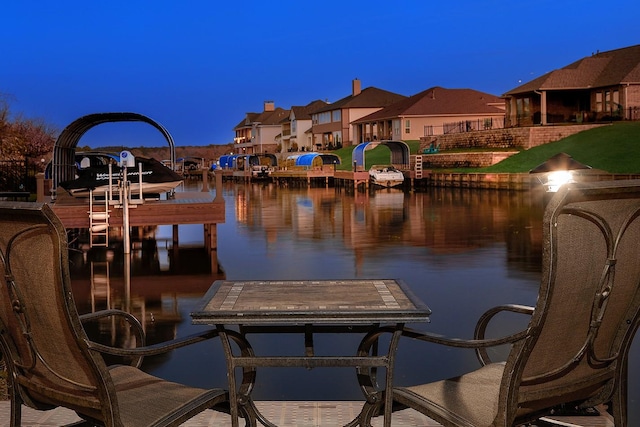 12595 St Louis Ct, Willis, TX 77318 - dock with a water view, a residential view, and boat lift