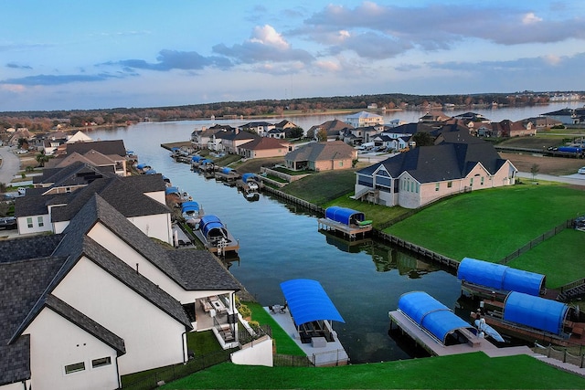 12595 St Louis Ct, Willis, TX 77318 - aerial perspective of suburban area with a large body of water