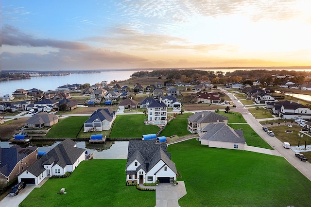12595 St Louis Ct, Willis, TX 77318 - aerial perspective of suburban area with a large body of water