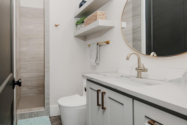 12595 St Louis Ct, Willis, TX 77318 - full bathroom featuring vanity, toilet, and a tile shower
