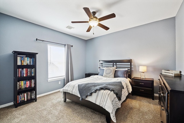 8718 Stowe Creek Ln, Missouri City, TX 77459 - carpeted bedroom with baseboards and a ceiling fan