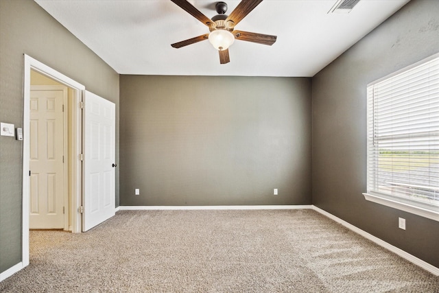 8718 Stowe Creek Ln, Missouri City, TX 77459 - empty room featuring ceiling fan, carpet, and baseboards
