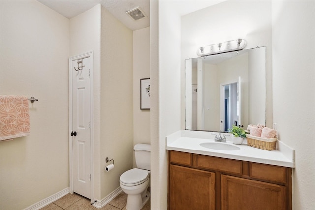 8718 Stowe Creek Ln, Missouri City, TX 77459 - bathroom featuring vanity, tile patterned flooring, toilet, and baseboards
