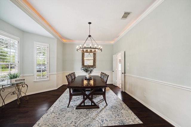 8718 Stowe Creek Ln, Missouri City, TX 77459 - dining area with a chandelier, dark wood-style flooring, crown molding, and baseboards