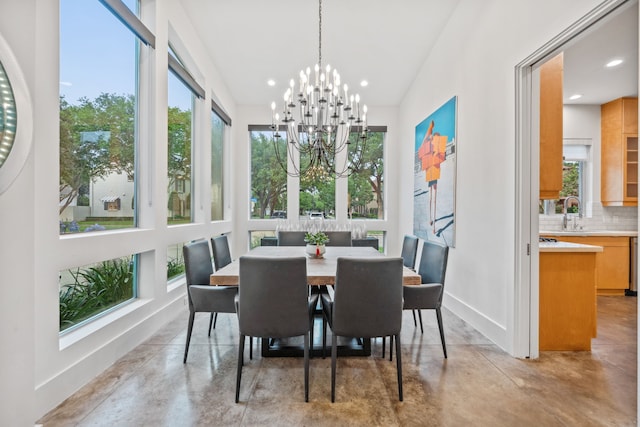 4102 Coleridge, West University Place, TX 77005 - dining space featuring finished concrete floors, baseboards, plenty of natural light, and recessed lighting