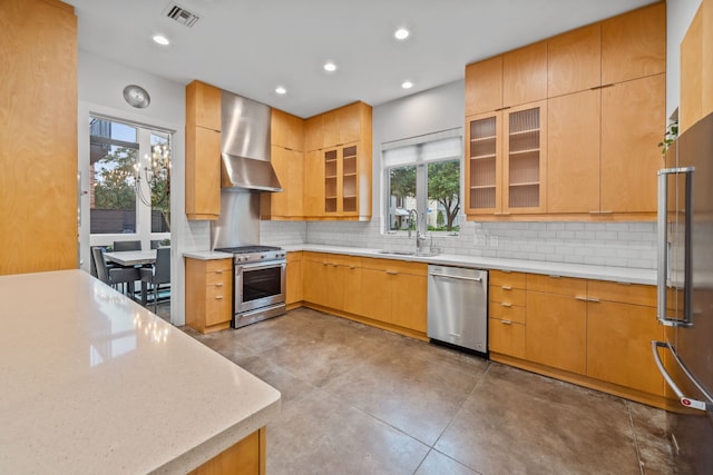 4102 Coleridge, West University Place, TX 77005 - kitchen with stainless steel appliances, wall chimney range hood, a sink, concrete flooring, and recessed lighting