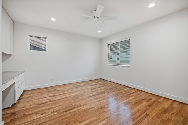 4102 Coleridge, West University Place, TX 77005 - unfurnished living room featuring light wood finished floors, a ceiling fan, baseboards, and recessed lighting