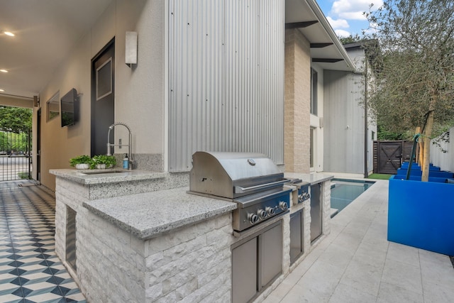 4102 Coleridge, West University Place, TX 77005 - view of patio featuring a sink and a gate