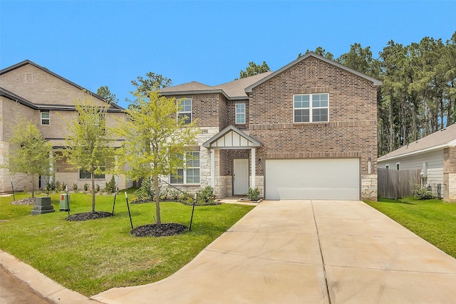25720 Sweetpea Ct, Montgomery, TX 77316 - view of front of house with stone siding, a garage, brick siding, and driveway