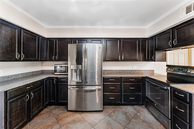 10134 Hanka Dr, Houston, TX 77043 - kitchen with appliances with stainless steel finishes, crown molding, light tile patterned floors, and light countertops