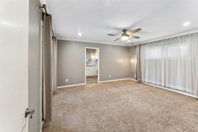 10134 Hanka Dr, Houston, TX 77043 - spare room with carpet flooring, a ceiling fan, ornamental molding, baseboards, and recessed lighting