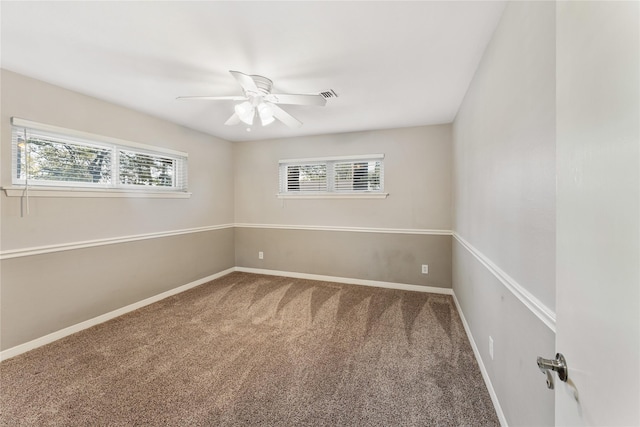 10134 Hanka Dr, Houston, TX 77043 - carpeted spare room featuring plenty of natural light, a ceiling fan, and baseboards