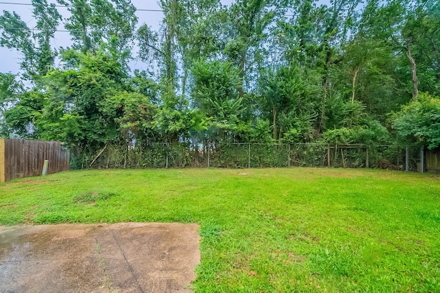8006 Barnhill Dr, Humble, TX 77338 - view of yard with a patio area