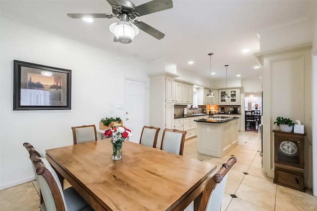 602 Rock Cv, Houston, TX 77079 - dining room with light tile patterned flooring, a ceiling fan, and recessed lighting