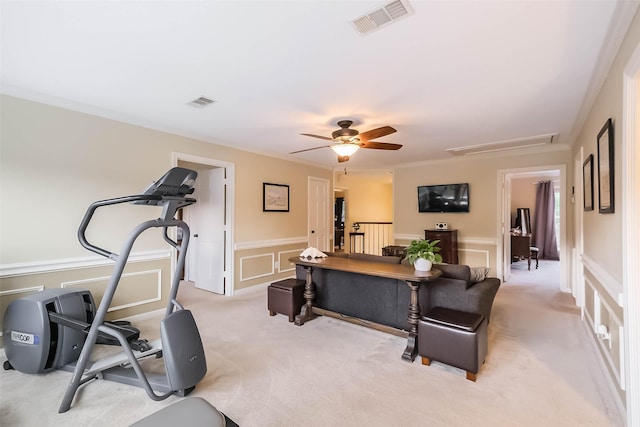 602 Rock Cv, Houston, TX 77079 - exercise room with a decorative wall, light carpet, ceiling fan, and wainscoting