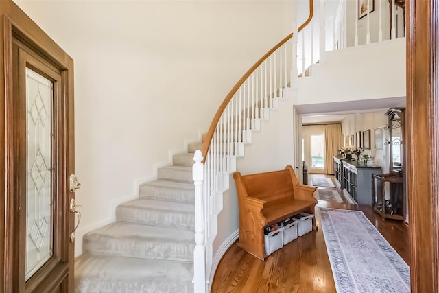 602 Rock Cv, Houston, TX 77079 - stairway with wood finished floors and a towering ceiling