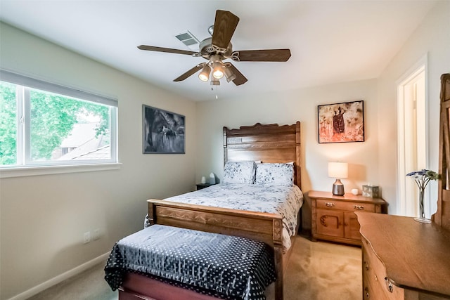 602 Rock Cv, Houston, TX 77079 - bedroom with light colored carpet, ceiling fan, and baseboards