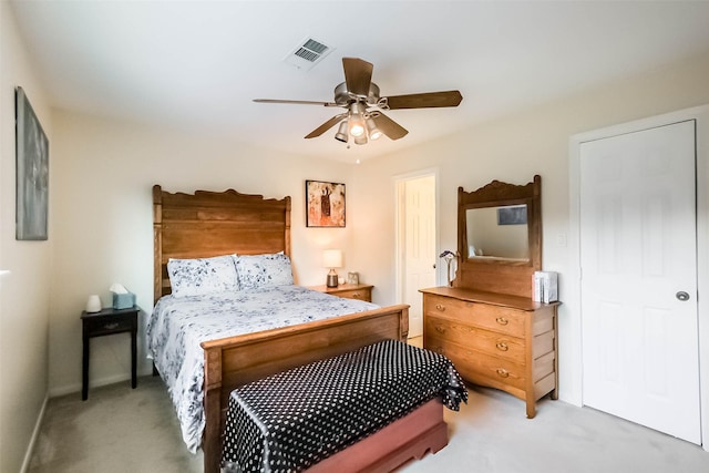 602 Rock Cv, Houston, TX 77079 - bedroom featuring light carpet, a ceiling fan, and baseboards