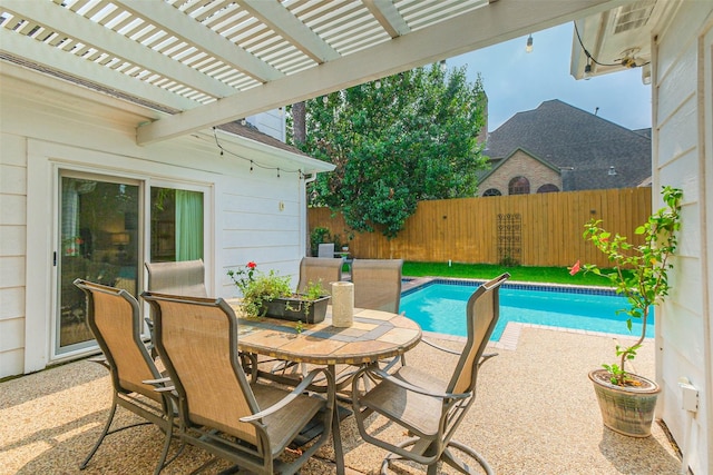 602 Rock Cv, Houston, TX 77079 - view of pool featuring a fenced backyard, a patio area, a pergola, and outdoor dining space