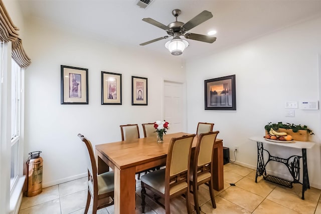 602 Rock Cv, Houston, TX 77079 - dining area featuring light tile patterned floors, ceiling fan, and baseboards