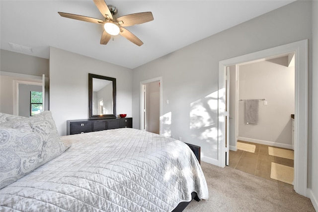 3148 Poe Dr, Montgomery, TX 77356 - carpeted bedroom featuring baseboards and a ceiling fan