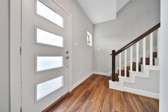 3148 Poe Dr, Montgomery, TX 77356 - entrance foyer with stairway, baseboards, and wood finished floors
