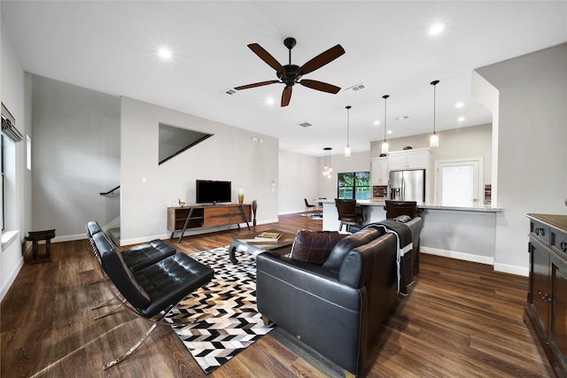 3148 Poe Dr, Montgomery, TX 77356 - living area featuring dark wood-style floors, ceiling fan, recessed lighting, and baseboards