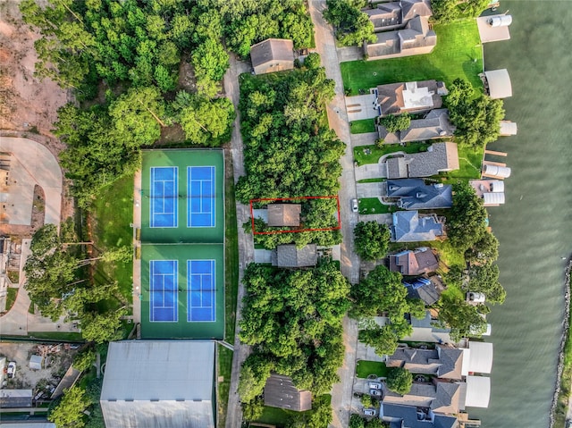 3148 Poe Dr, Montgomery, TX 77356 - view of property location with property boundaries highlighted and nearby suburban area