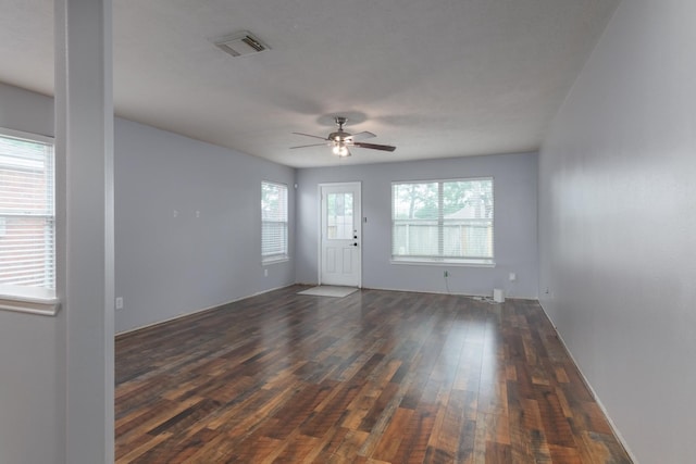 24027 Pinecreek Pt, Spring, TX 77373 - spare room featuring dark wood-style floors and ceiling fan