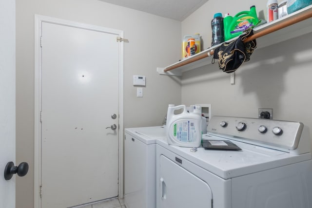 24027 Pinecreek Pt, Spring, TX 77373 - laundry area featuring washer and dryer