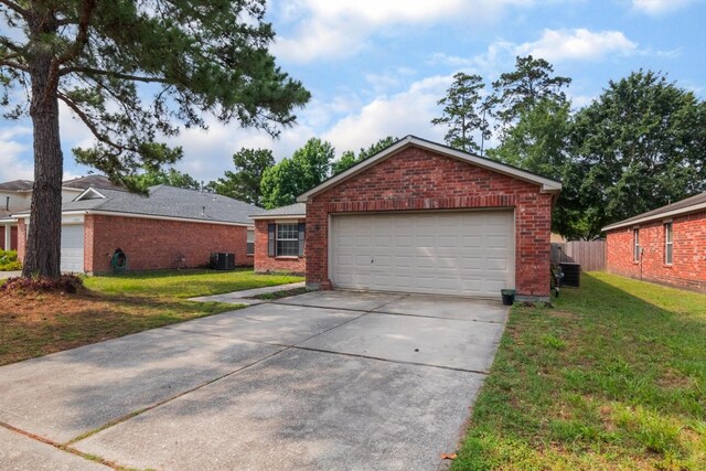 24027 Pinecreek Pt, Spring, TX 77373 - garage with concrete driveway and central air condition unit