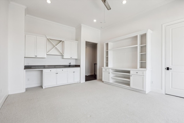 3850 Glen Arbor Dr, Houston, TX 77025 - interior space featuring light colored carpet, recessed lighting, wet bar, ornamental molding, and baseboards