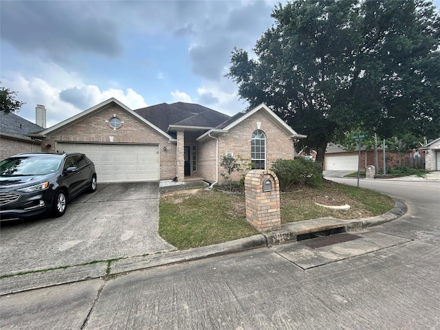3123 Candle Cabin Ln, Spring, TX 77388 - ranch-style house with brick siding, a garage, concrete driveway, and a front yard
