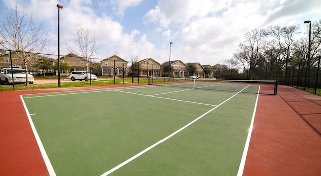 1725 Harvey Mitchell Pkwy S Unit 2433, College Station, TX 77840 - view of tennis court featuring a residential view