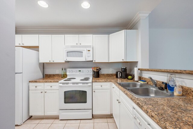 1725 Harvey Mitchell Pkwy S Unit 2433, College Station, TX 77840 - kitchen with white appliances, a sink, light tile patterned floors, white cabinetry, and crown molding