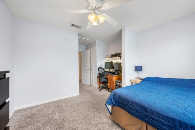 1725 Harvey Mitchell Pkwy S Unit 2433, College Station, TX 77840 - carpeted bedroom featuring baseboards, ceiling fan, attic access, and an office area