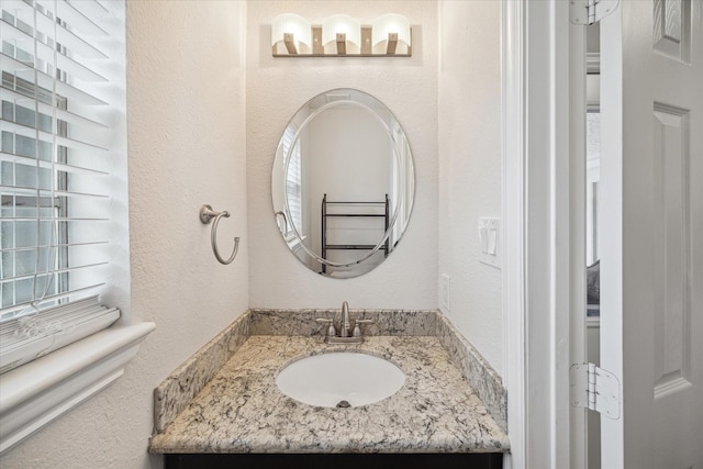 2714 Fontana Dr, Houston, TX 77043 - bathroom featuring vanity and a textured wall