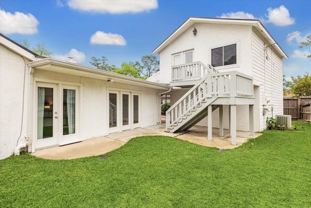 2714 Fontana Dr, Houston, TX 77043 - rear view of property with stairway, stucco siding, central AC unit, and a deck