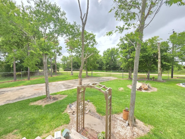 182 Smith Rd, Palacios, TX 77465 - view of yard with view of wooded area