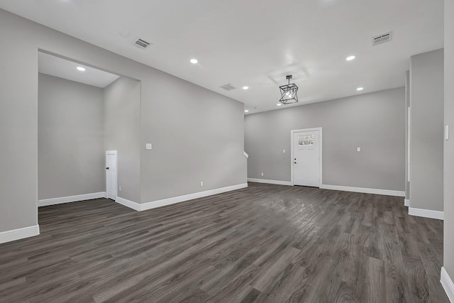 9805 Fabiola Dr, Houston, TX 77075 - unfurnished room with dark wood-style flooring, baseboards, and recessed lighting